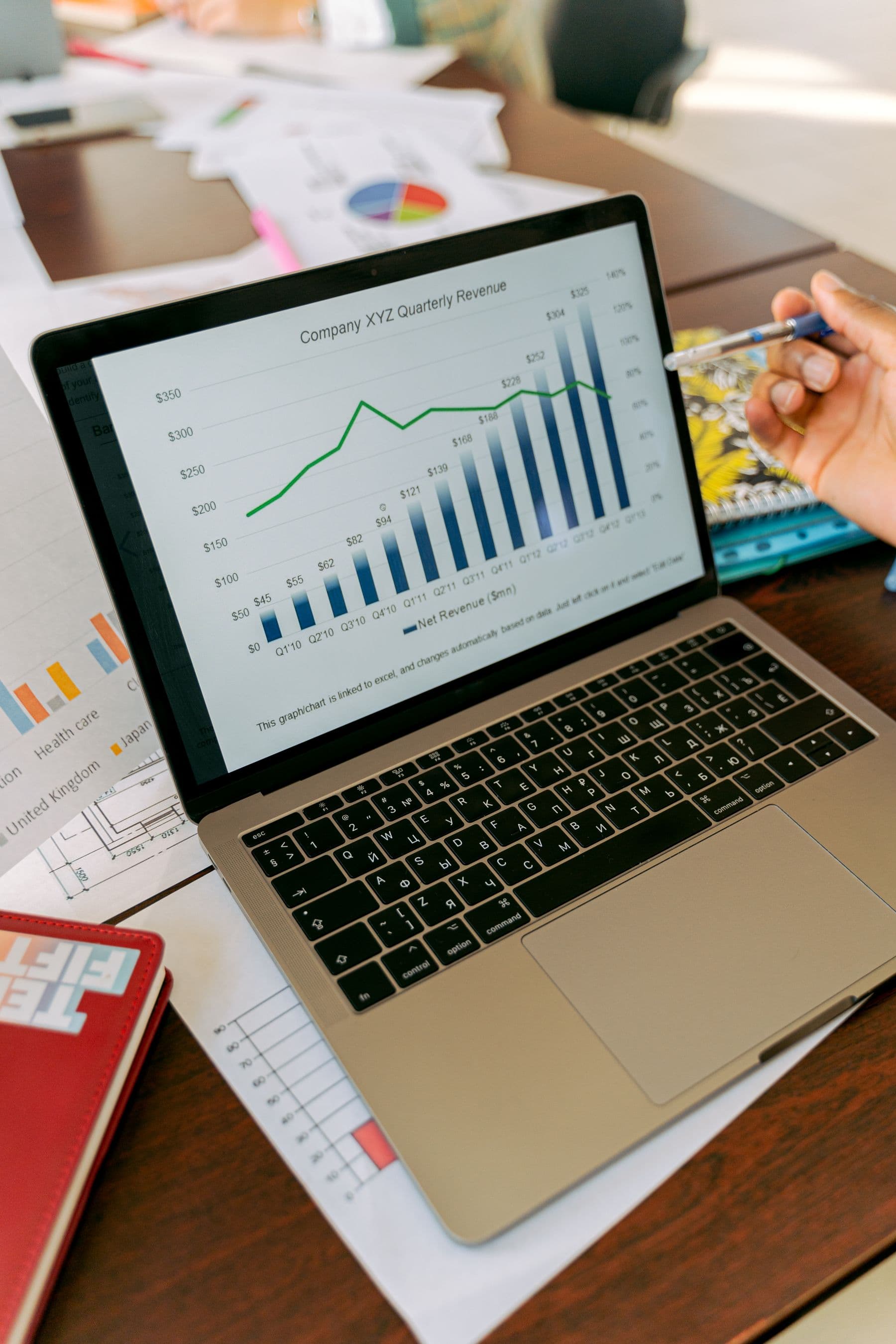 A person reviewing marketing analytics on a laptop