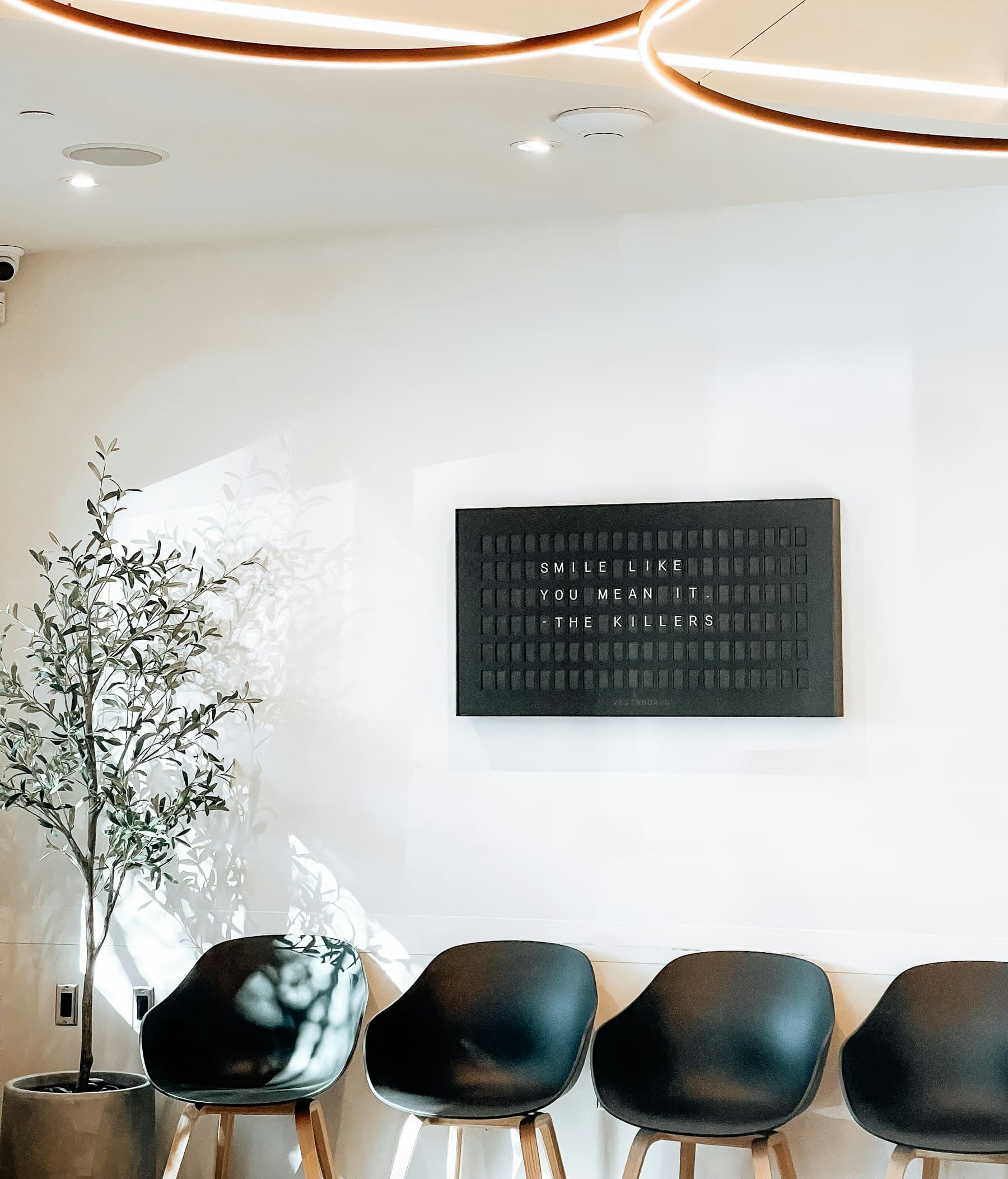 A bright, modern dental practice waiting area